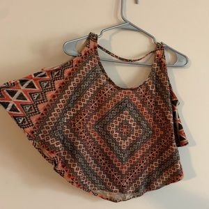 Hybrid poncho/tank top with fun orange and brown patterns/print